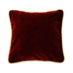 Poduszka ozdobna z aksamitu zdobiona złotym sznurem